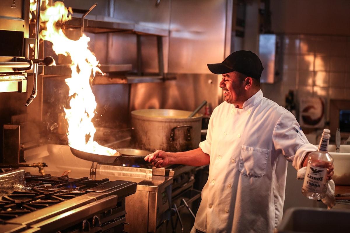 A chef working the line in a commercial kitchen