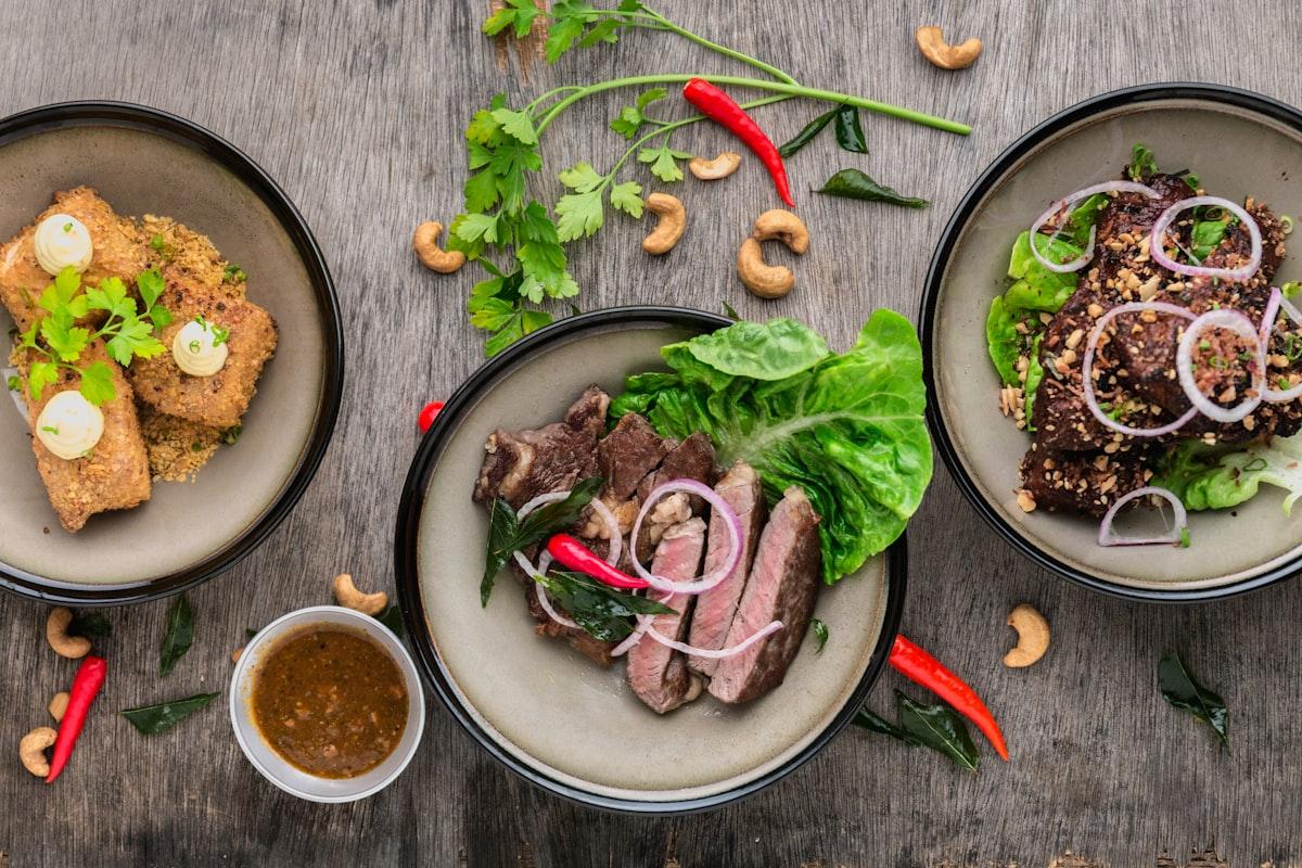Three plated dishes photographed from above