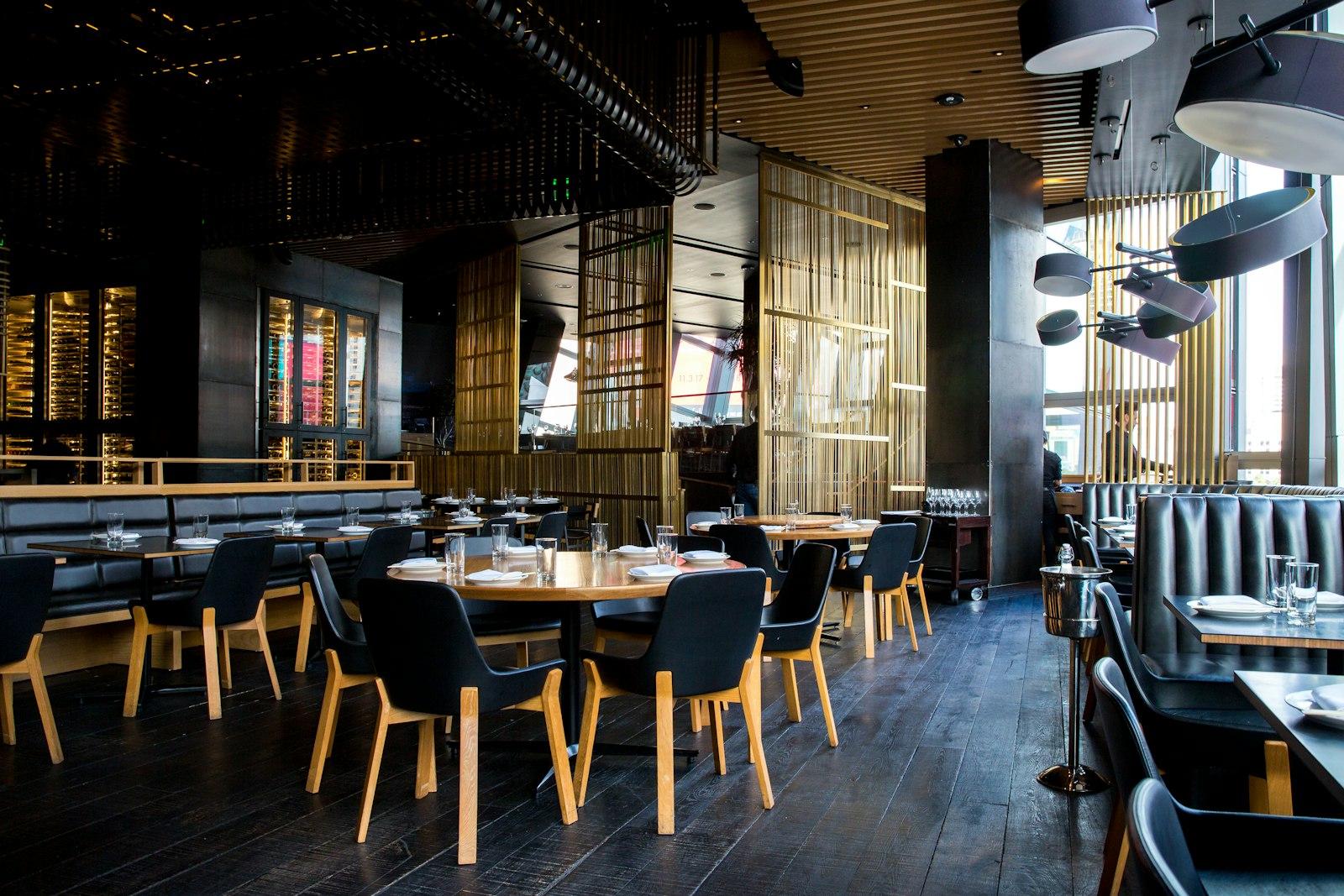 A modern restaurant dining room set for service